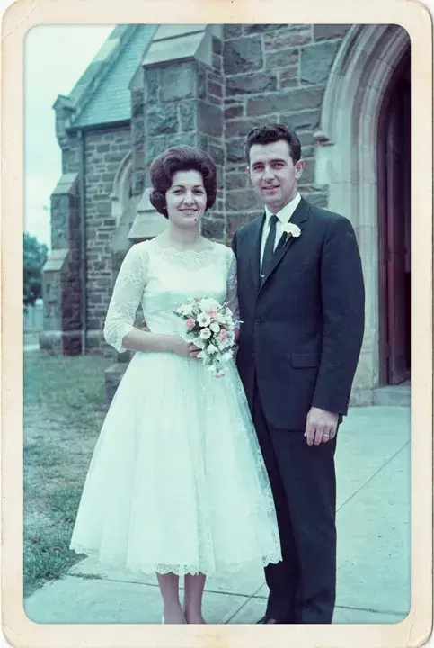 A bride and groom outside a church