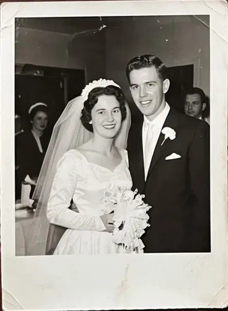 Black and white wedding portrait of a bride and groom.